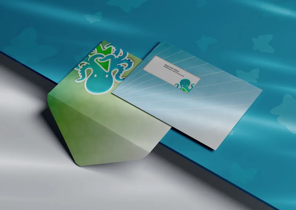 Aqua Zoo Triton envelope and flap with the octopus logo on a teal surface.