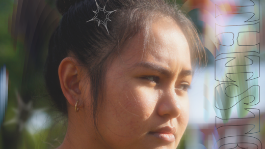 A photo of a filipina girl looking away from the camera, serious look.
